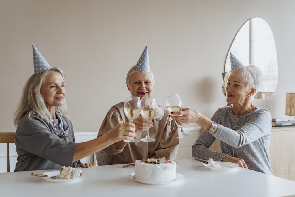 Photo of Elderly Women Doing a Toast